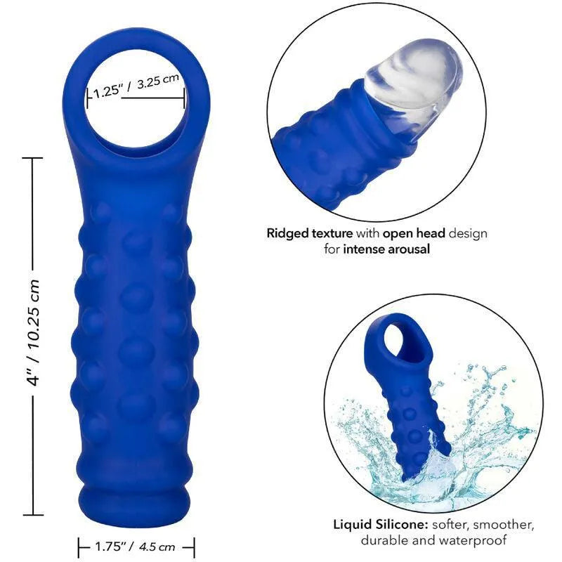 Anneau pénien bleu en silicone liquide, texture nervurée, double chambre, sangle scrotale intégrée, sans phtalates.