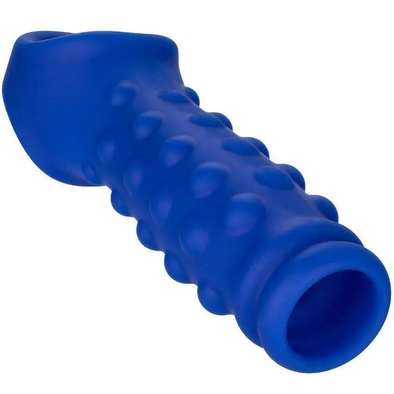 Cockring bleu en silicone liquide, texture à reliefs, design ergonomique avec sangle scrotale intégrée, sans phtalates.