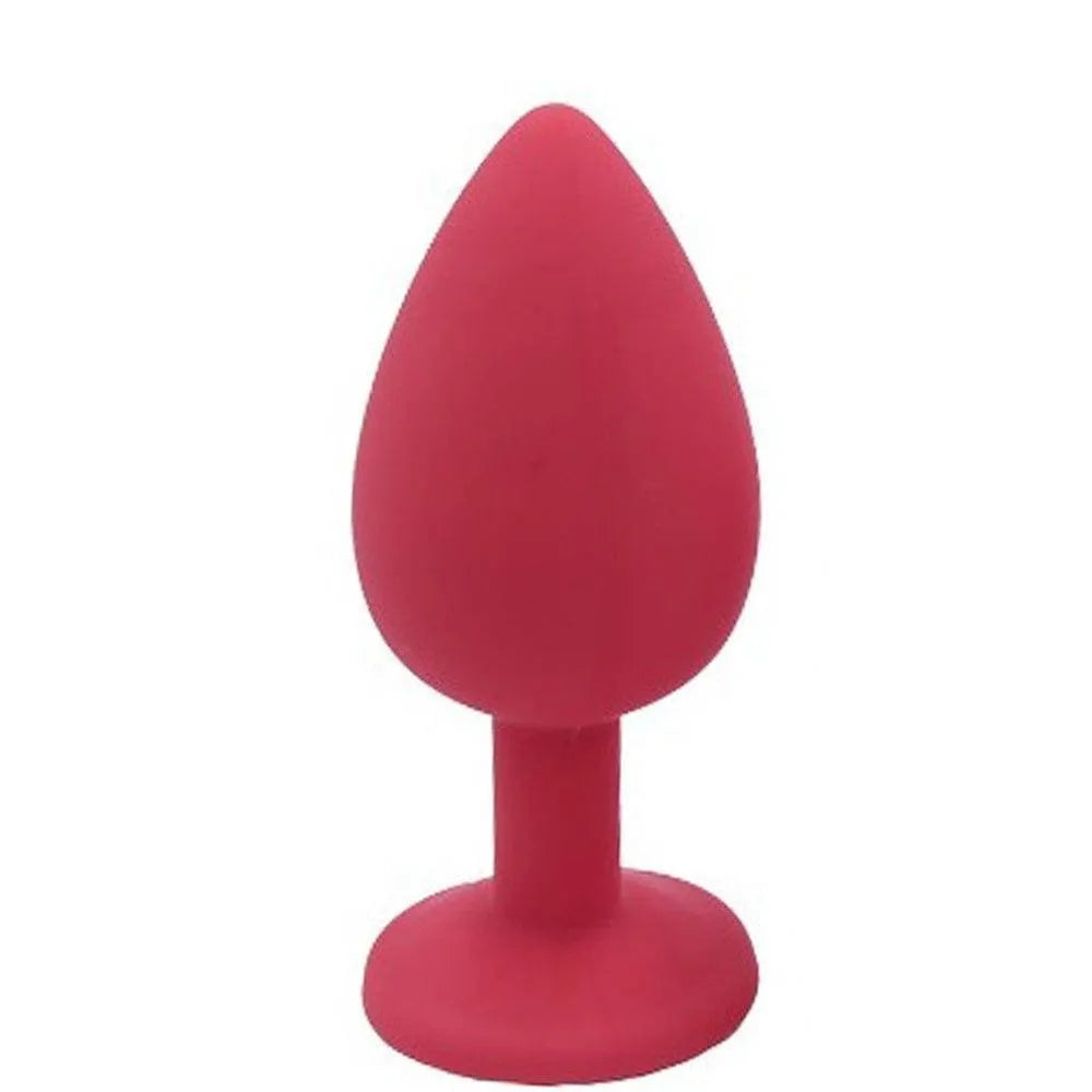 Bouchon anal silicone rouge avec bijou cristal, 8cm, 3.5cm diamètre, élégance et douceur, accessoire intime raffiné.