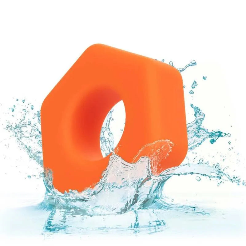 Anneau pénien orange en silicone liquide, forme hexagonale, éclaboussures d'eau, extensible et imperméable.