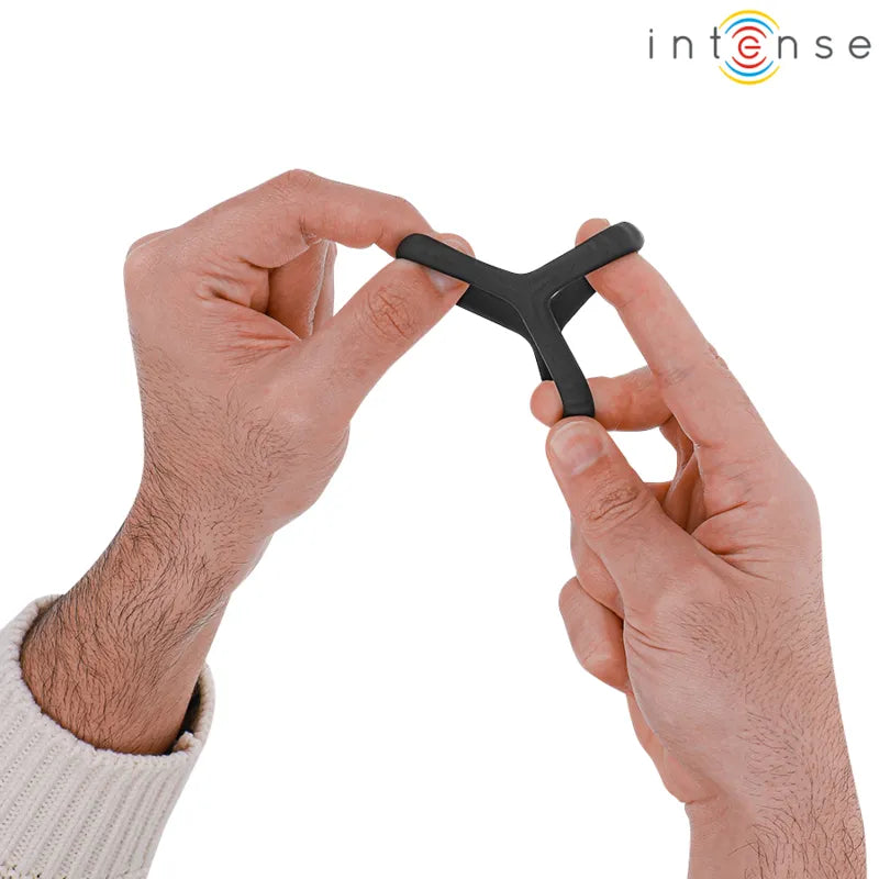 Anneau double en silicone noir, flexible et ergonomique, tenu par des mains, pour intensité et prolongation érection.