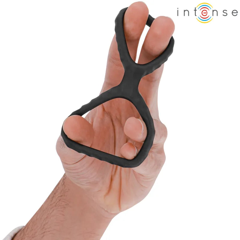 Anneau double silicone noir ergonomique, flexible, ajustable, pour intensification et prolongation des performances intimes.