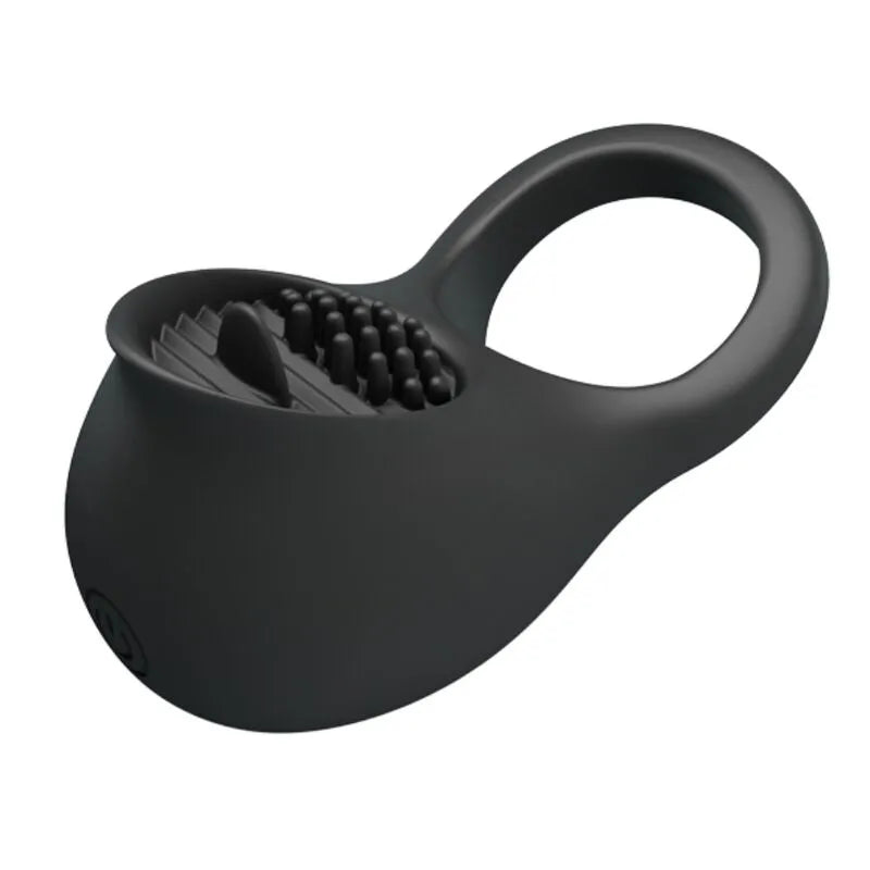 Anneau pénien noir en silicone avec stimulateur clitoridien texturé, rechargeable USB, design ergonomique.