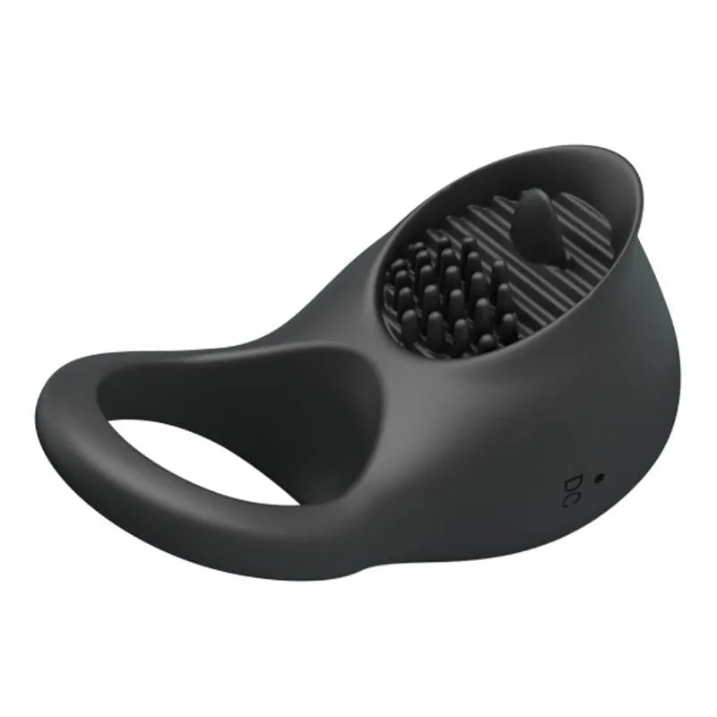 Anneau pénien noir en silicone avec stimulateur clitoridien texturé, rechargeable USB, design ergonomique.
