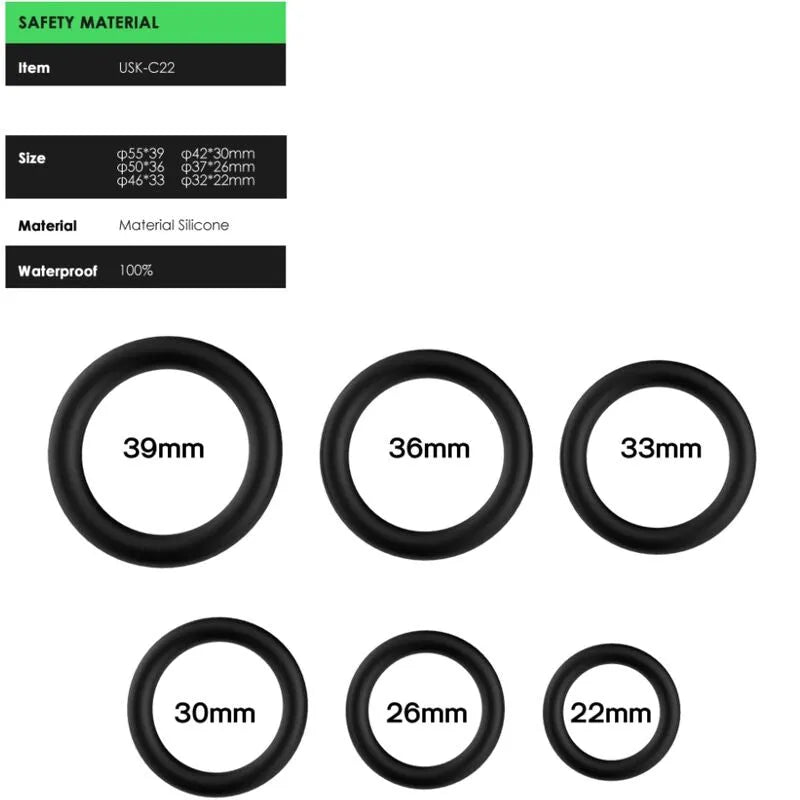 Anneau silicone noir ergonomique, six tailles variées, confort et adhérence, pour endurance et plaisir accrus.