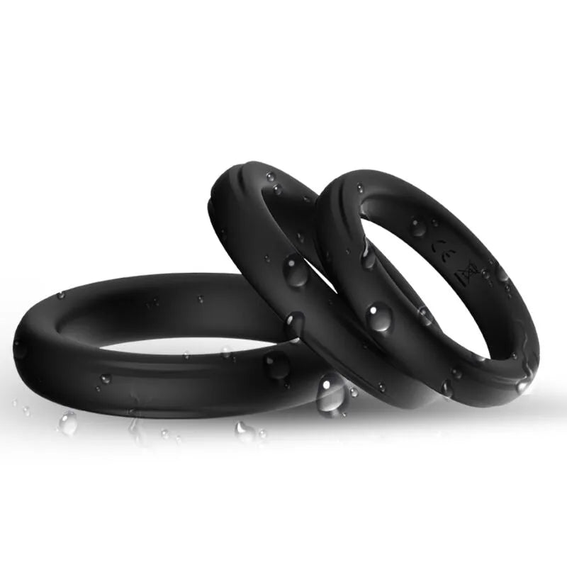 Anneau pénien noir en silicone médical, ergonomique, avec surface lisse et extensible, pour confort et stimulation optimale.
