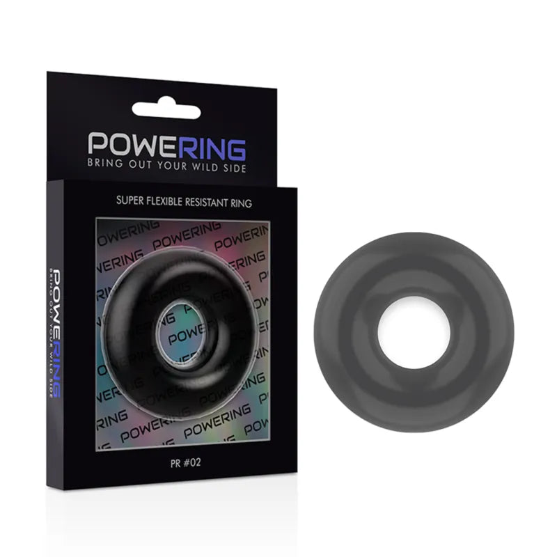 Anneau pénien silicone noir, doux et soyeux, pour érection ferme, dans emballage Powering moderne et élégant.