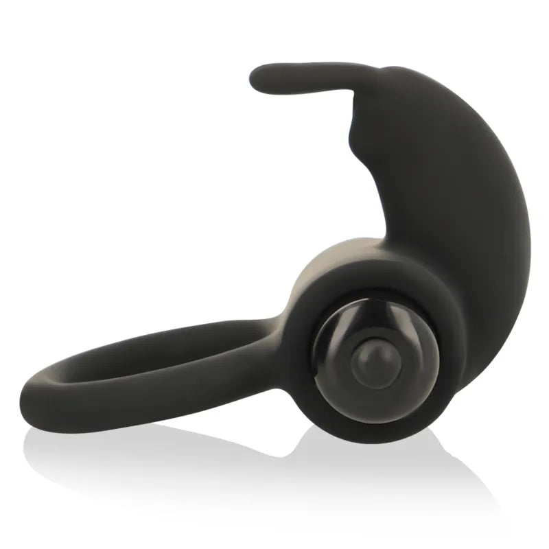 Anneau pénien vibrant noir en silicone, ergonomique, extensible, avec stimulateur amovible pour plaisir et performance.