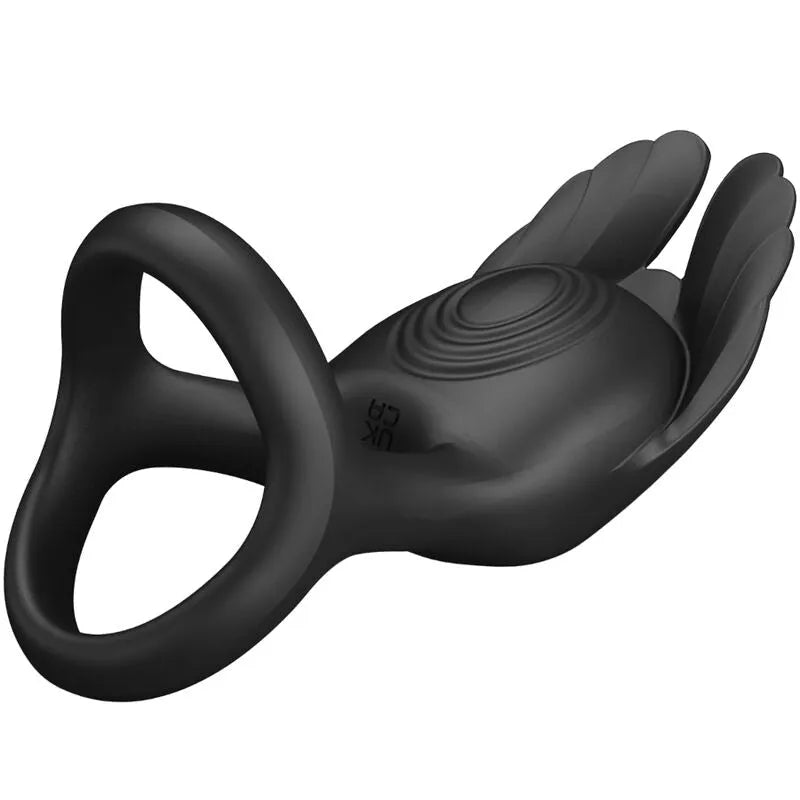 Anneau pénien vibrant noir en silicone avec stimulation clitoridienne, rechargeable USB, compact et ergonomique.