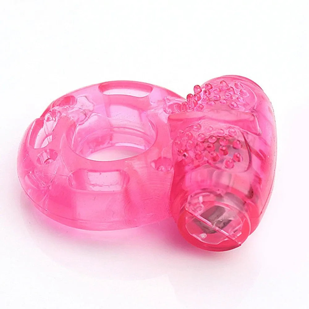 Anneau pénien vibrant rose transparent en TPR extensible, stimulation érection, compact, piles LR41 incluses.