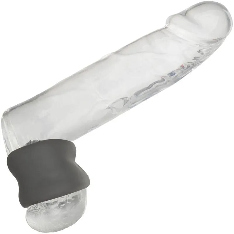 Anneau scrotum silicone liquide noir, forme sablier, ultra-élastique, sur fond blanc, pour confort et endurance intime.