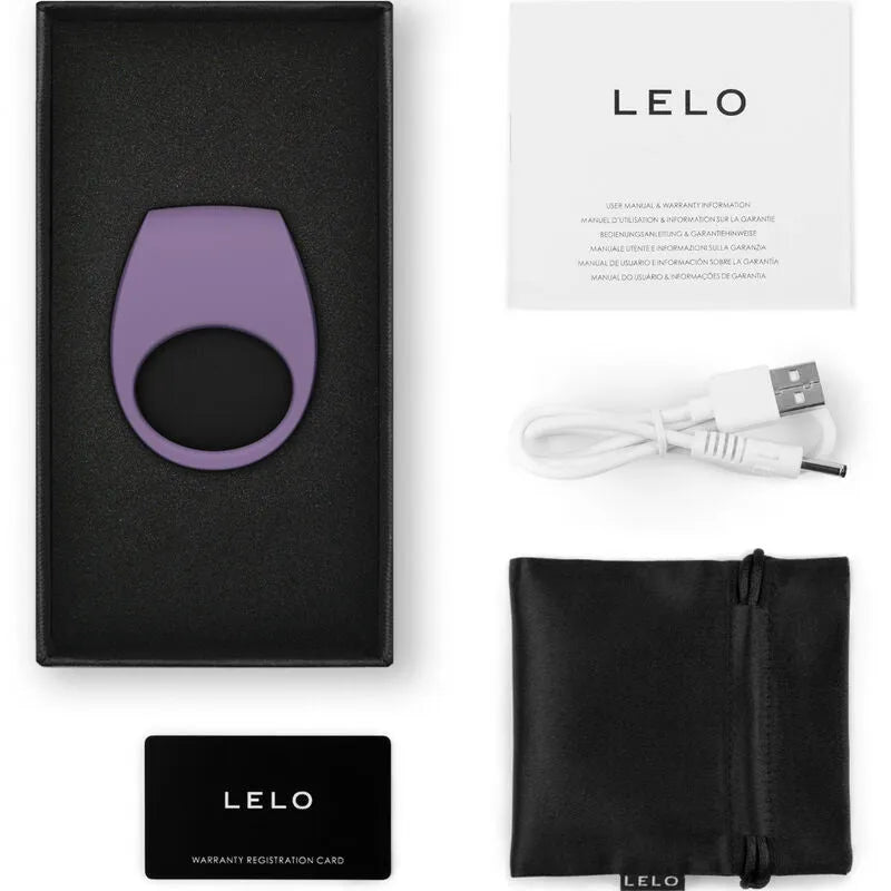 Anneau vibrant connecté violet en silicone, ergonomique, avec accessoires: câble USB, pochette, carte garantie.