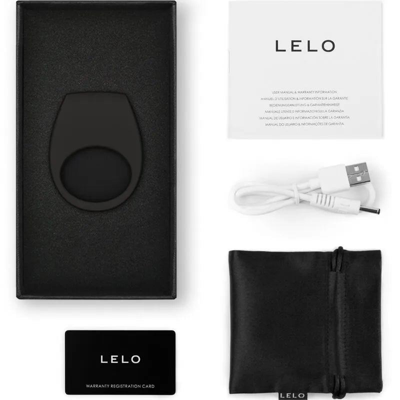 Anneau vibrant connecté noir en silicone dans boîte, avec câble USB, pochette et documentation LELO.