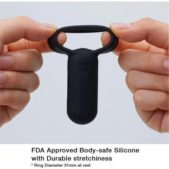 Anneau vibrant noir en silicone hypoallergénique, compact et imperméable, avec cinq modes de vibration pour couples.