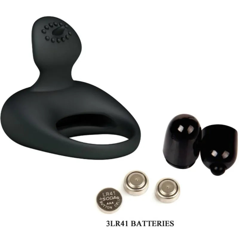 Anneau vibrant noir en silicone ergonomique avec stimulateur, piles incluses, pour couples recherchant confort et discrétion.