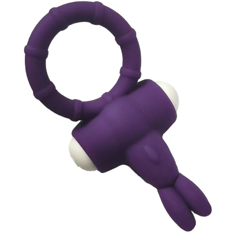 Anneau vibrant violet en silicone médical, étanche, ergonomique, avec détails blancs, pour plaisir aquatique discret.
