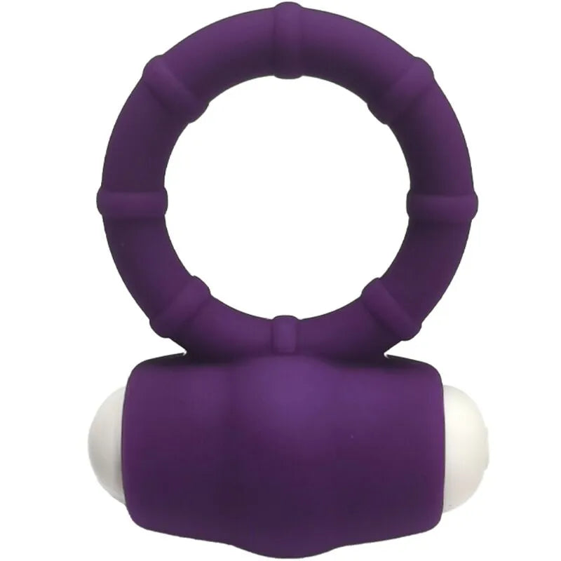 Anneau vibrant violet en silicone médical, submersible, compact, avec moteur blanc, idéal pour plaisir aquatique en couple.