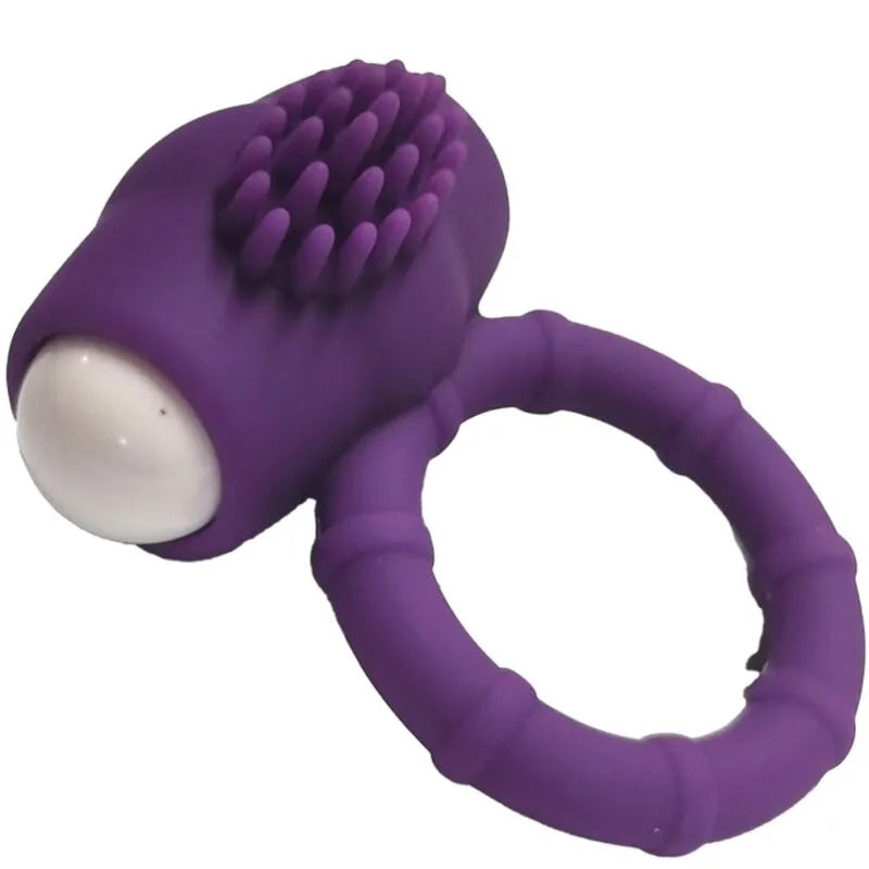 Anneau vibrant violet en silicone médical, submersible, avec texture ergonomique pour plaisir aquatique.