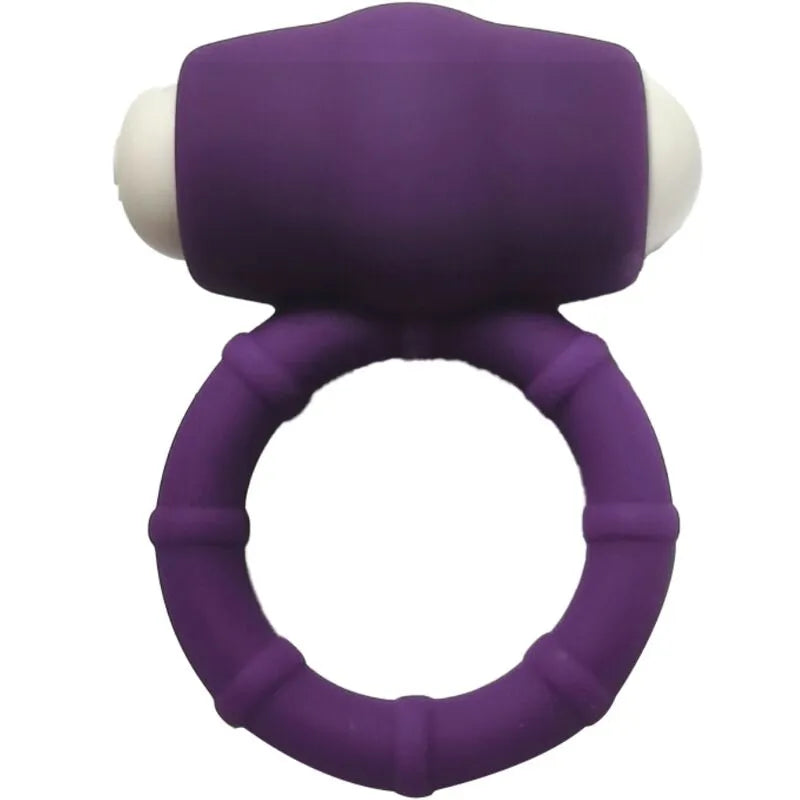 Anneau vibrant violet en silicone médical, compact et étanche, avec détails ergonomiques pour plaisir aquatique.