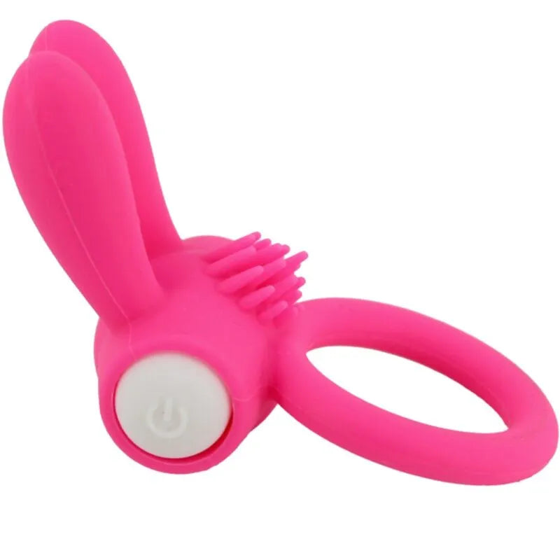 Anneau vibrant rose en silicone médical, étanche, ergonomique, avec bouton blanc, conçu pour le plaisir intime aquatique.