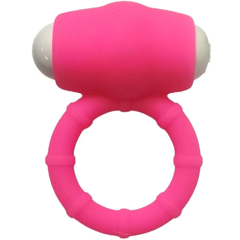 Anneau vibrant rose en silicone médical, forme ergonomique, étanche, pour couples, avec compartiment à piles visible.