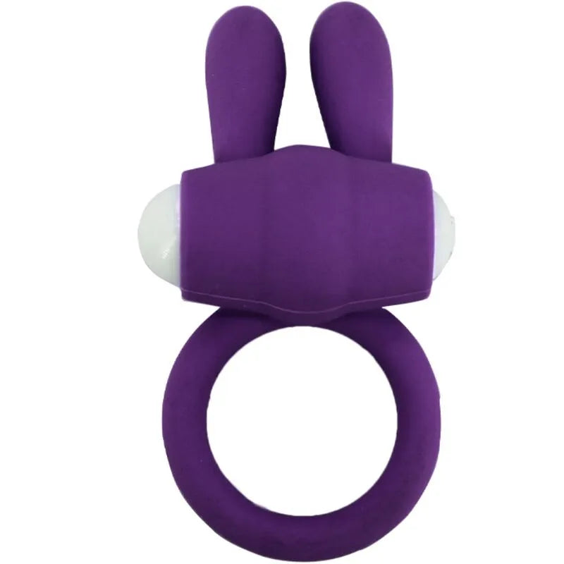 Anneau vibrant violet en silicone médical, forme ergonomique, étanche, avec deux extensions, idéal pour moments intimes.