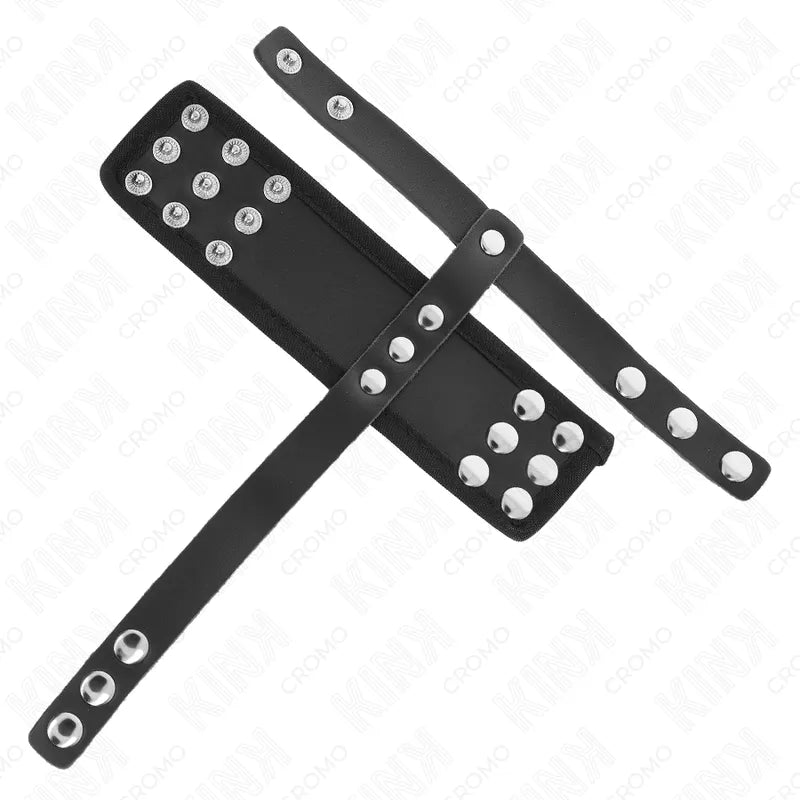 Anneaux péniens cuir noir ajustables, design BDSM, boutons pression, élégance et confort pour stimulation érotique.