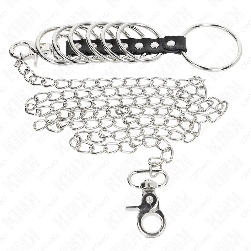 Anneaux péniens réglables en cuir noir avec chaînes métalliques, élégants et durables pour expérience BDSM personnalisée.