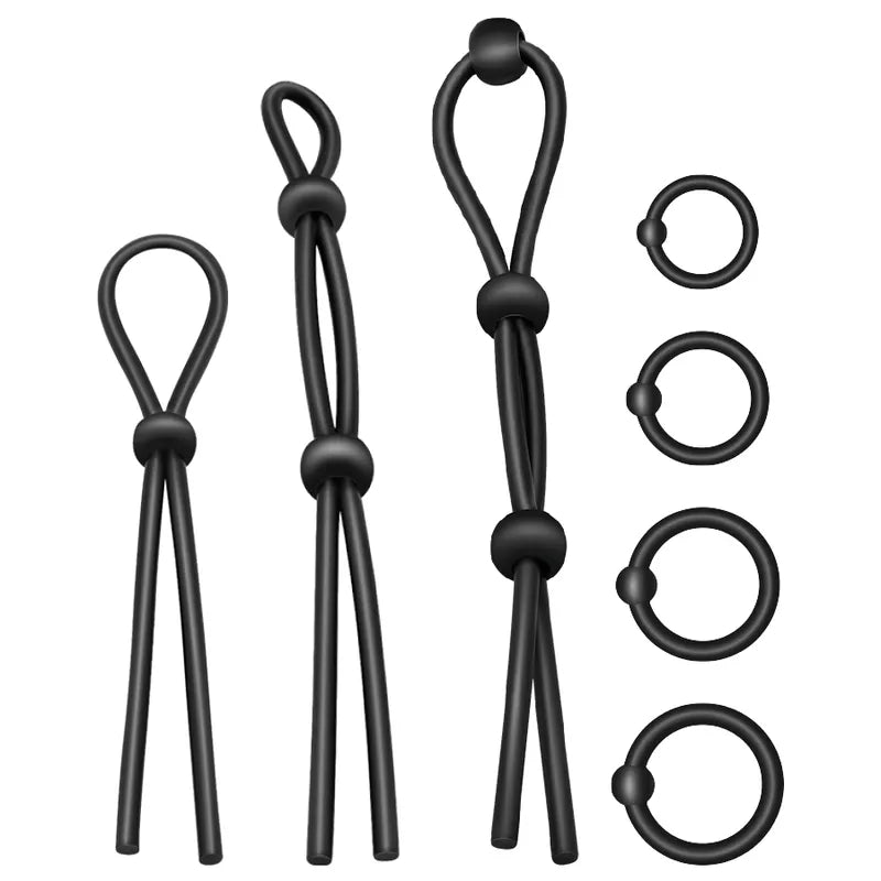 Anneaux pénis silicone noirs ajustables, élastiques, hypoallergéniques, pour prolongation éjaculation et confort optimal.