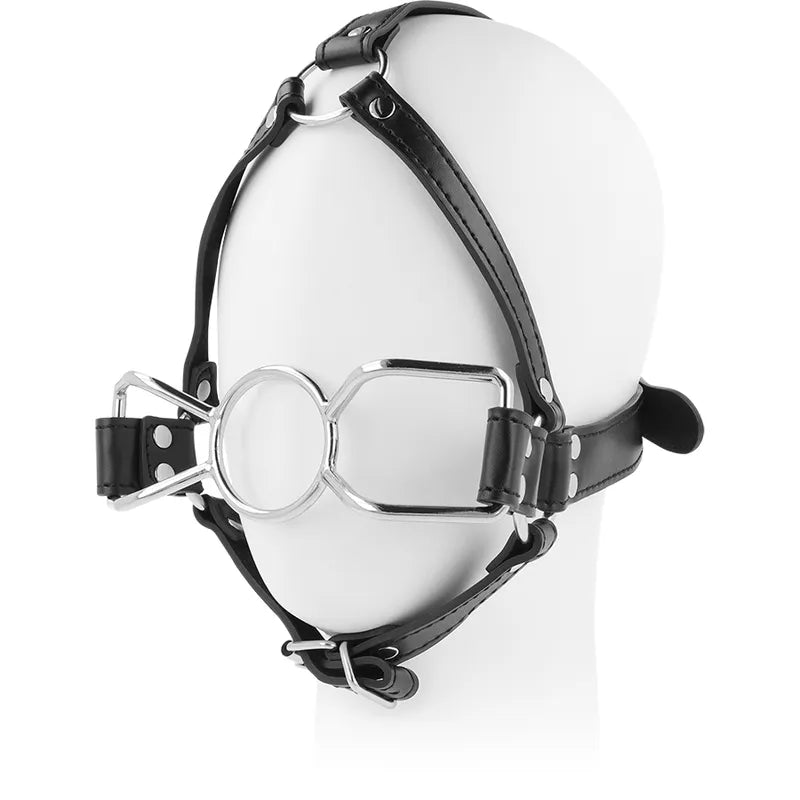 Bâillon harnais BDSM en acier inoxydable, sangle noire réglable, design robuste, confort optimal pour exploration fétichiste.