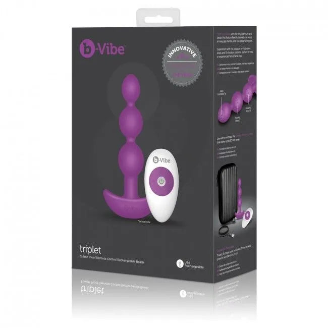 Plug anal violet B-Vibe Triplet avec télécommande, silicone soyeux, deux moteurs, 6 intensités, 15 modes, boîte grise.