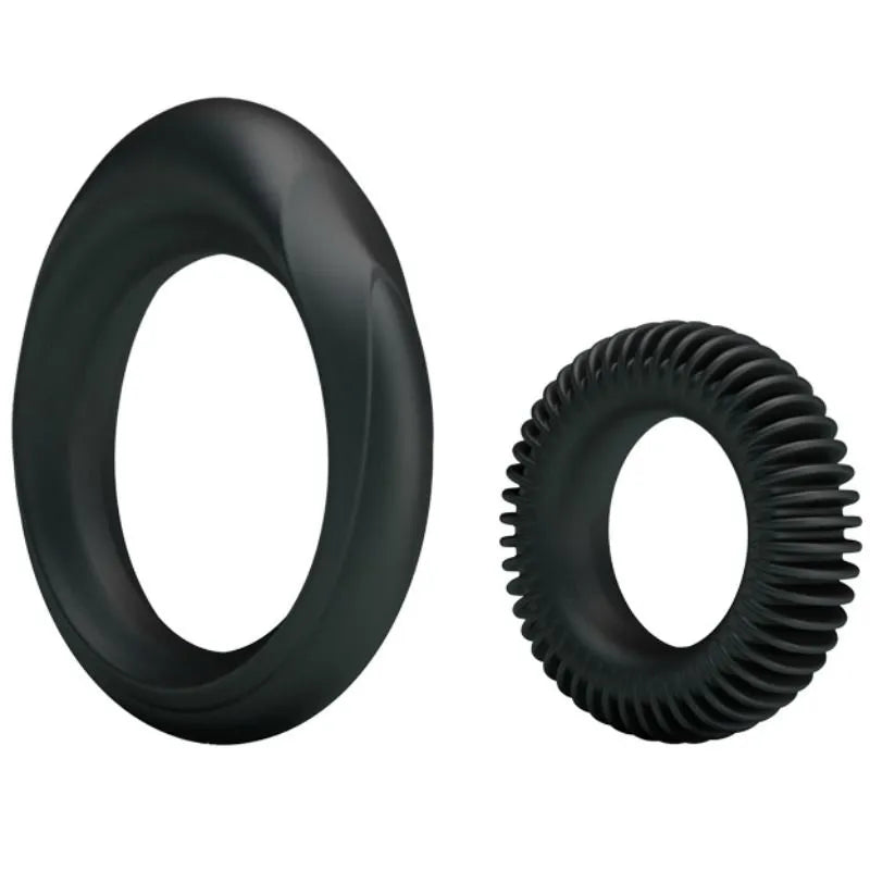 Bagues retardatrices éjaculation en silicone noir, formes ergonomiques, surface lisse et texturée, pour confort optimal.