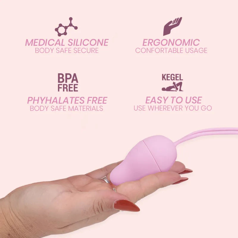 Balle Kegel rose en silicone hypoallergénique, ergonomique, tenue dans une main, avec cordon pour insertion facile.