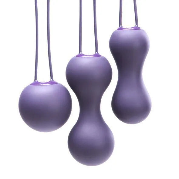 Balles de Kegel lilas en silicone, trois formes progressives pour tonification pelvienne, confort et hygiène optimisés.