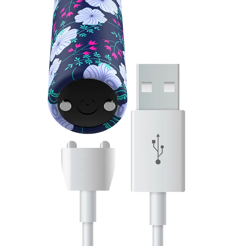 Balle vibrante compacte silicone fleurie avec chargeur USB, design élégant et discret, idéale pour voyage et usage personnel.