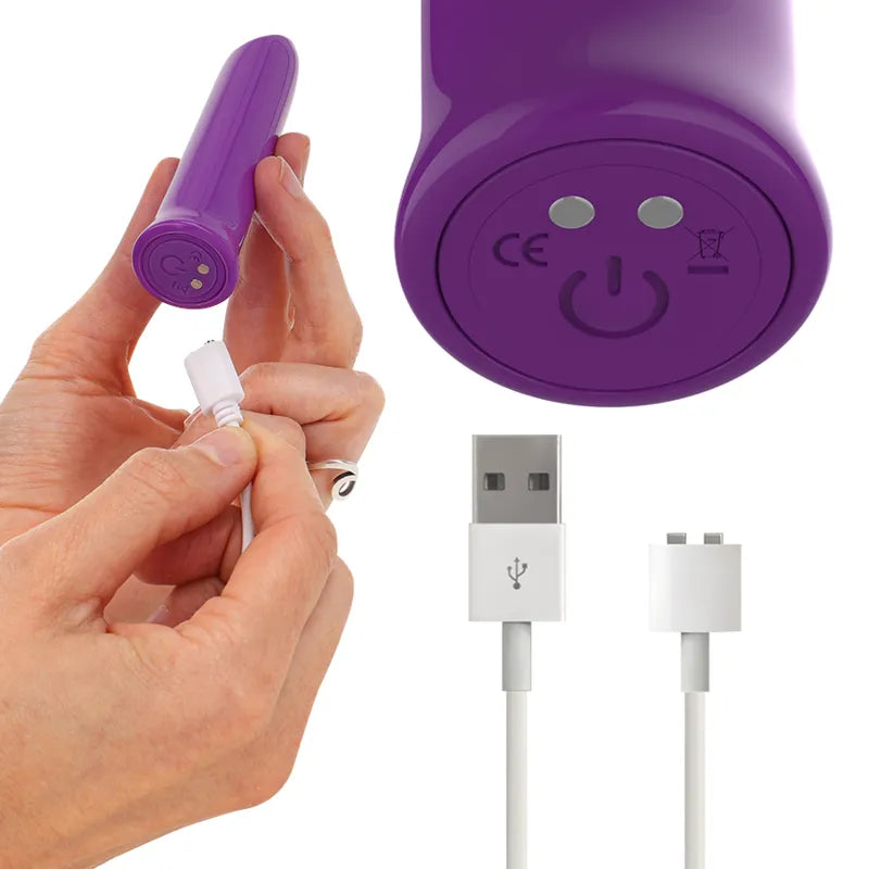 Balle vibrante violette en silicone, étanche, compacte, avec câble USB, boutons de commande visibles, design élégant.