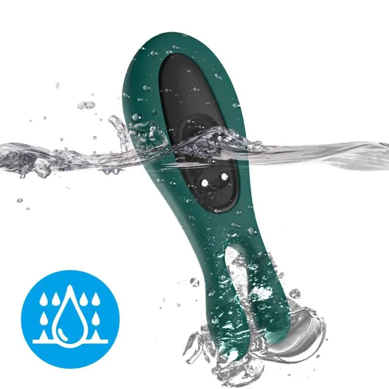 Balle vibrante étanche en silicone vert, compacte, avec neuf modes de vibration, immergée dans l'eau, hypoallergénique.