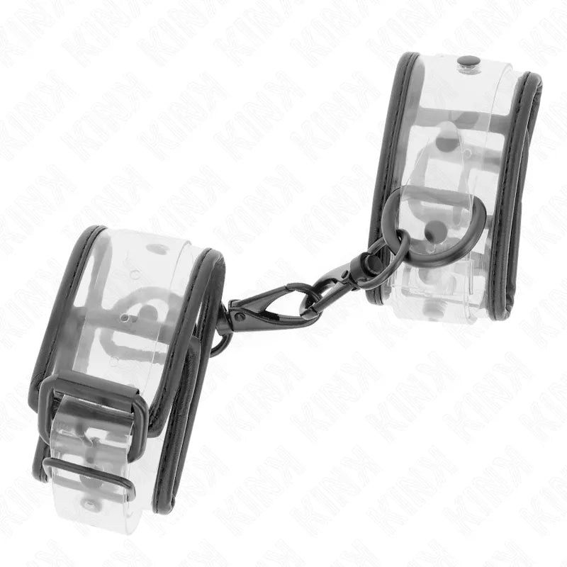 Bandes de poignet BDSM en cuir noir, boucles métalliques robustes, design élégant et ajustable pour confort et sécurité.