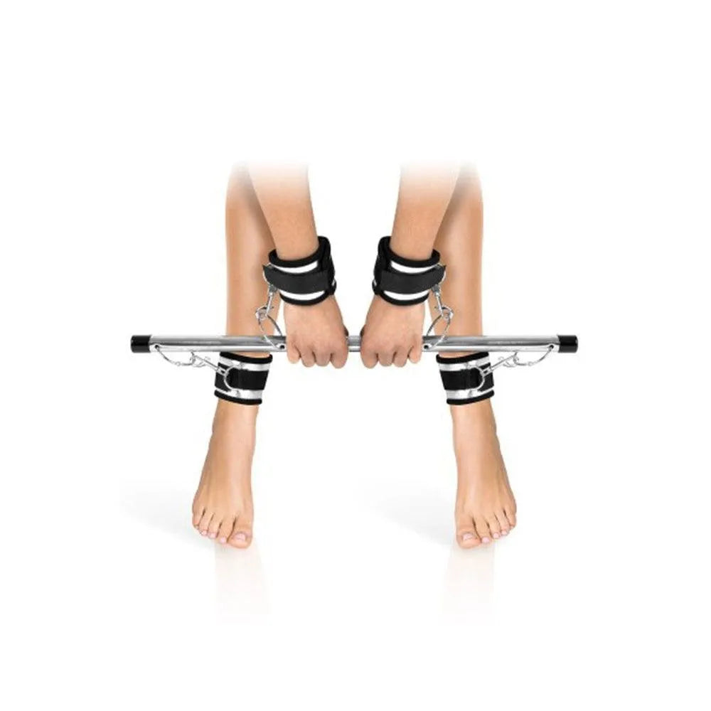 Barre bondage métal alliage aluminium néoprène menottes velcro ajustables mousquetons robustesse durabilité confort maintien position penchée intensité sensation couple
