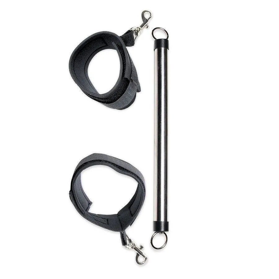 Barre d'écartement ajustable en métal avec attaches chevilles néoprène noir, confort et sécurité pour débutants.