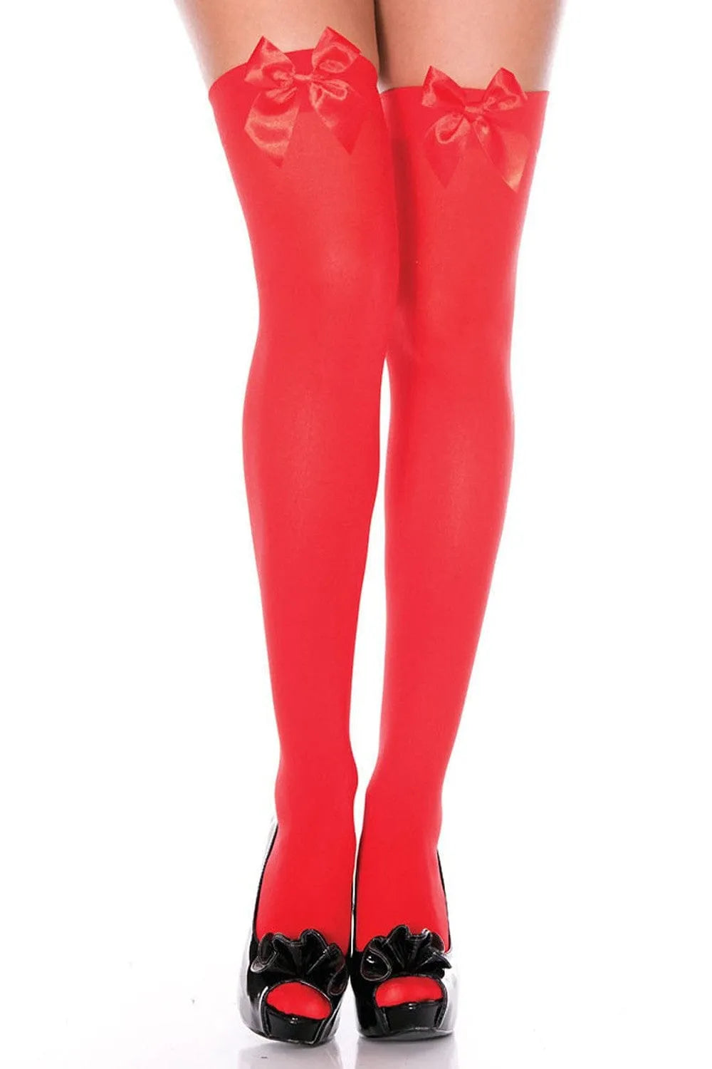 Bas opaques rouges avec nœuds satinés, élégants et glamour, en nylon doux et extensible, pour allure féminine et sensuelle.