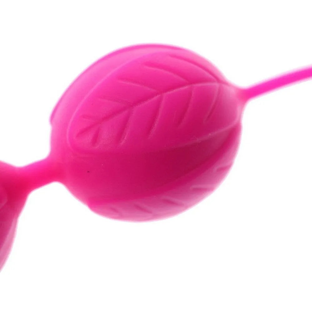 Boules de Geisha roses en silicone souple avec motifs, pour stimulation intime et rééducation périnéale, étanches.