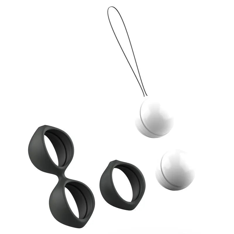 Boule de Geisha en silicone noir avec poids ajustables blancs, harnais ergonomique et cordon de retrait, étanche.