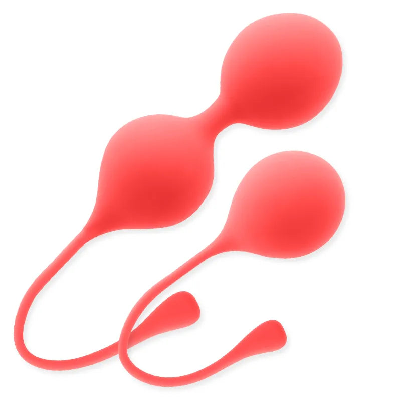 Boules chinoises rouges en silicone doux, forme ergonomique, pour renforcement pelvien, débutantes et avancées.