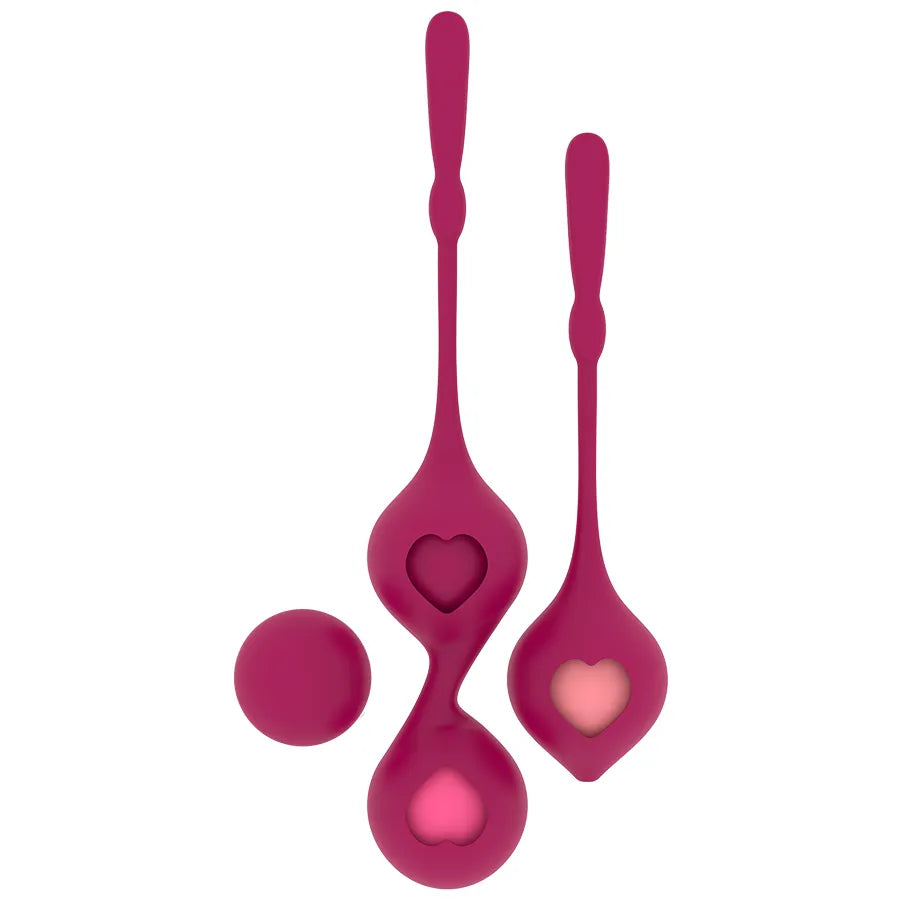 Boules de Geisha en silicone médical rose, formes variées avec cœurs, pour renforcement pelvien et tonification vaginale.