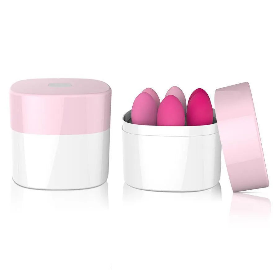 Boules de Geisha en silicone rose et fuchsia dans un coffret blanc et rose, pour renforcement pelvien progressif.