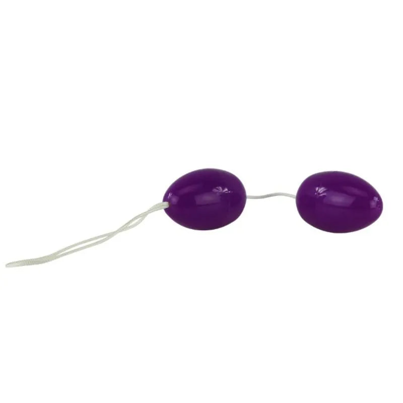 Boules de Geisha lilas avec cordon vibrant, stimulation intime, renforcement pelvien, design élégant, ABS sécurisé.