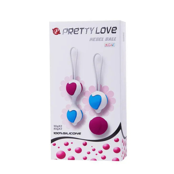 Boules de geisha Pretty Love en silicone doux, rose et bleu, sur emballage blanc, pour renforcement pelvien.