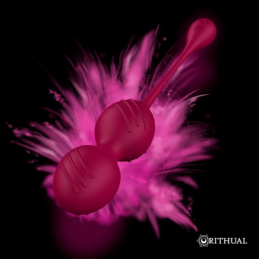 Boules de Geisha rouges en silicone médical, vibrantes, ergonomiques, sur fond noir avec éclat rose.