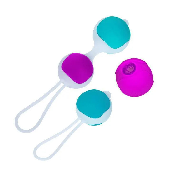 Boules de geisha silicone interchangeables, bleu et rose, avec cordon blanc, pour tonification pelvienne et bien-être intime.